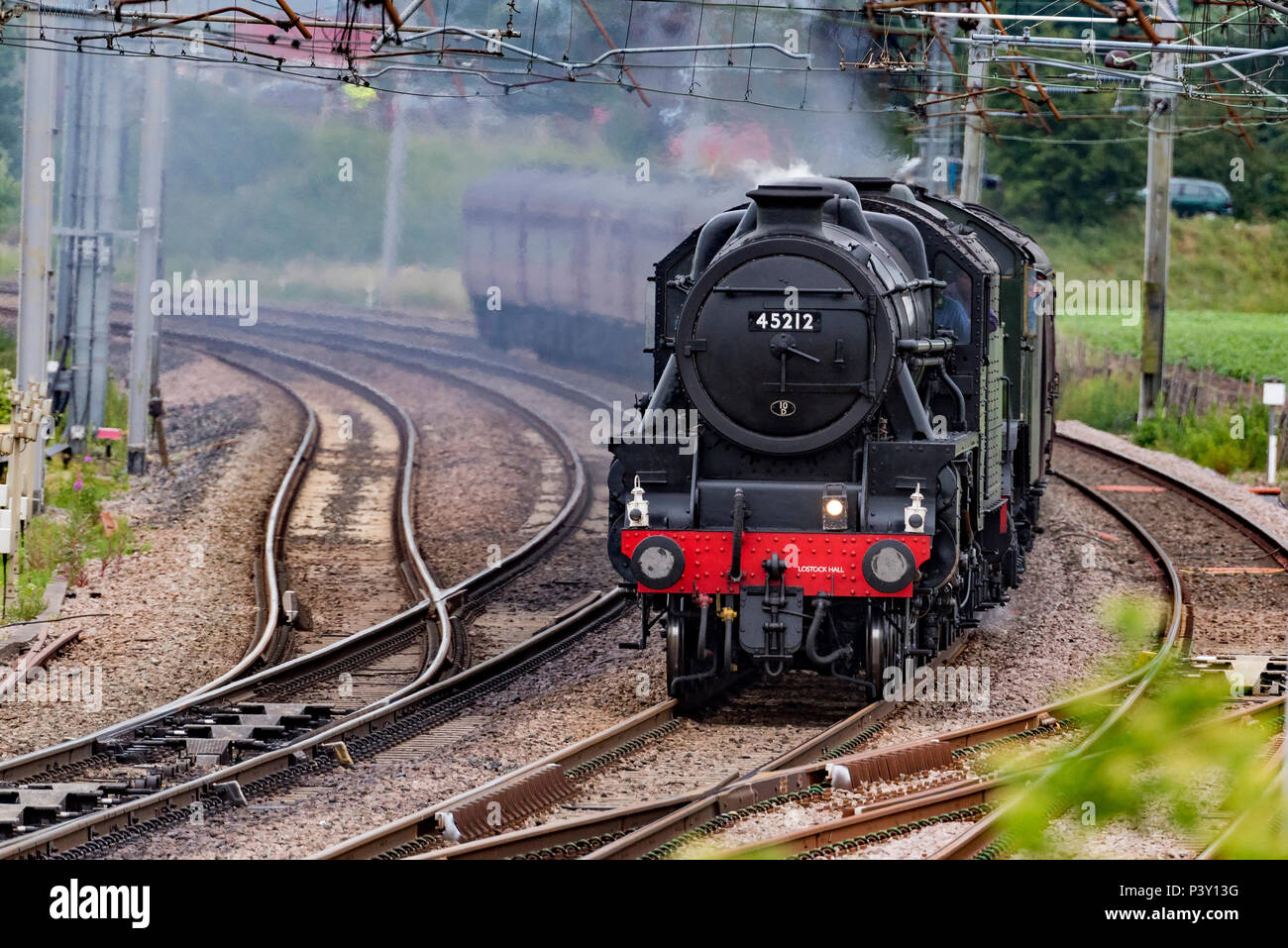 Winwick Cheshire United Kingdom.  18th June 2018. The world’s most famous steam locomotive, LNER A3 Class 4-6-2 no 60103 Flying Scotsman seen crossing Stock Photo