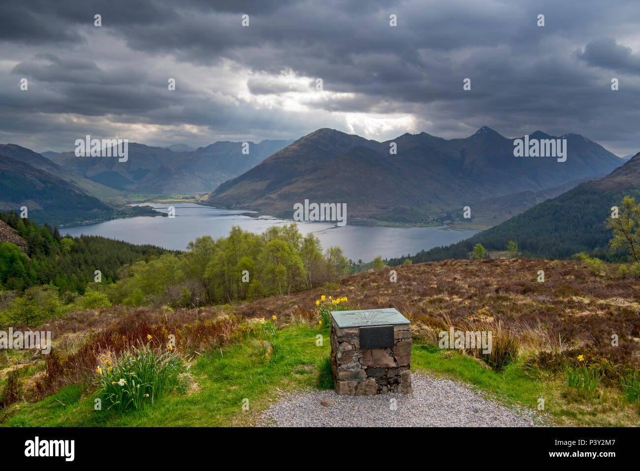 Orientation table at the Bealach Ratagain / Ratagan viewpoint with names of the mountain summits of the Five Sisters of Kintail, Highland, Scotland Stock Photo