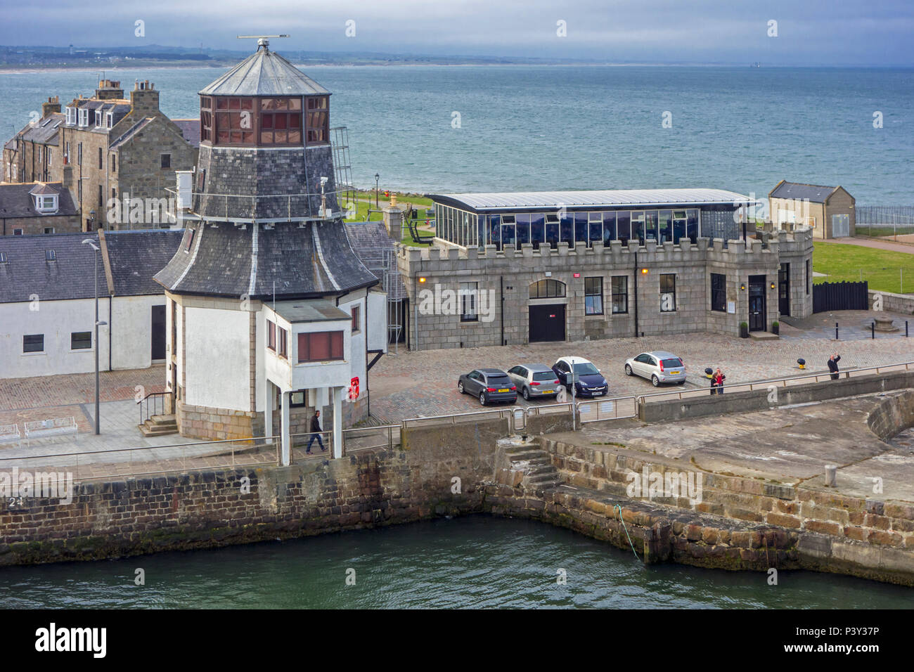 The old harbour master's control tower at entrance to the Aberdeen port, Aberdeenshire, Scotland, UK Stock Photo