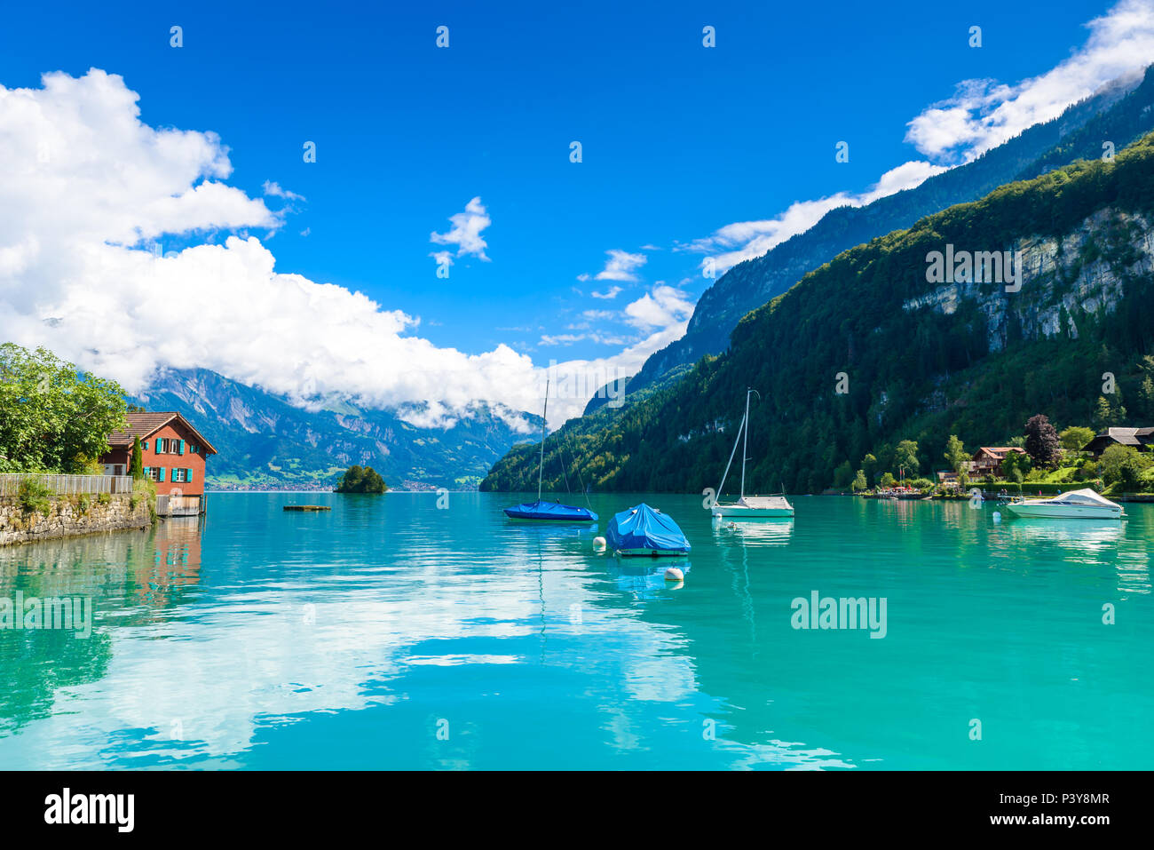 Village Iseltwald At Lake Brienz Beautiful Lake In The Alps At village-iseltwald-at-lake-brienz-beautiful-lake-in-the-alps-at