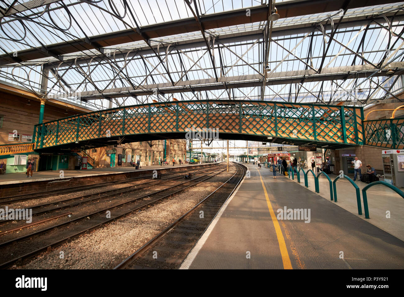 footbridge between platforms interior of Carlisle railway train station Carlisle Cumbria England UK Stock Photo