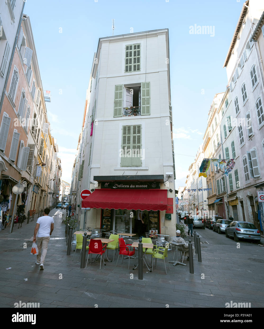men walk near and in arabic food store in old part of marseille city center Stock Photo Alamy