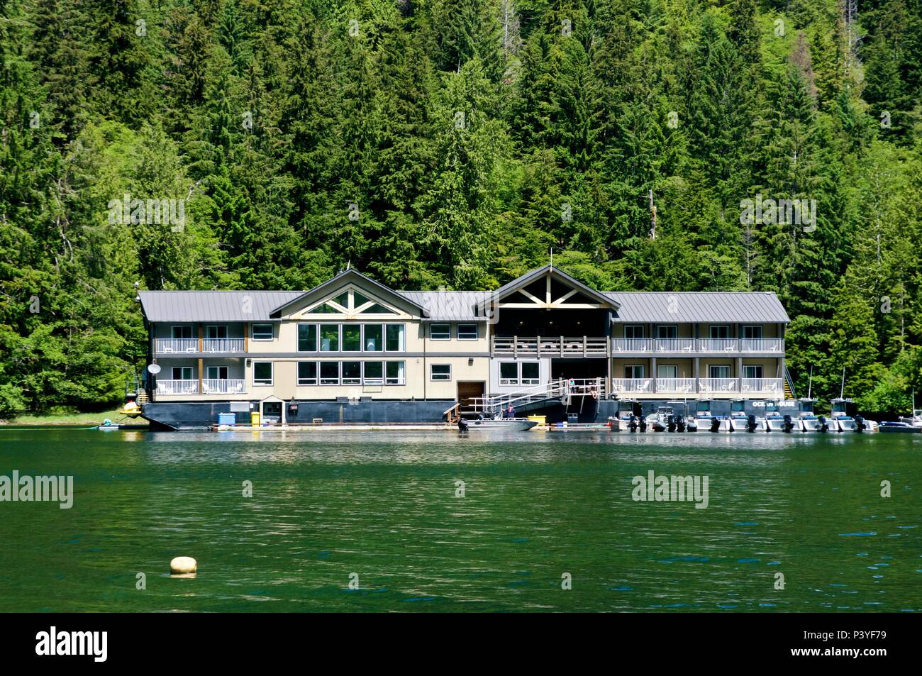 Ocean House floating resort at Stads K'uns Gawga (Peel Inlet) Haida Gwaii Stock Photo
