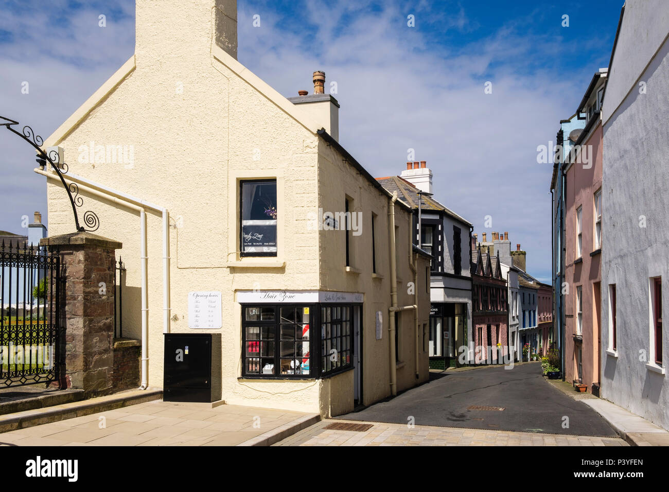 View down narrow street in old town. Castle Street, Peel, Isle of Man, British Isles Stock Photo