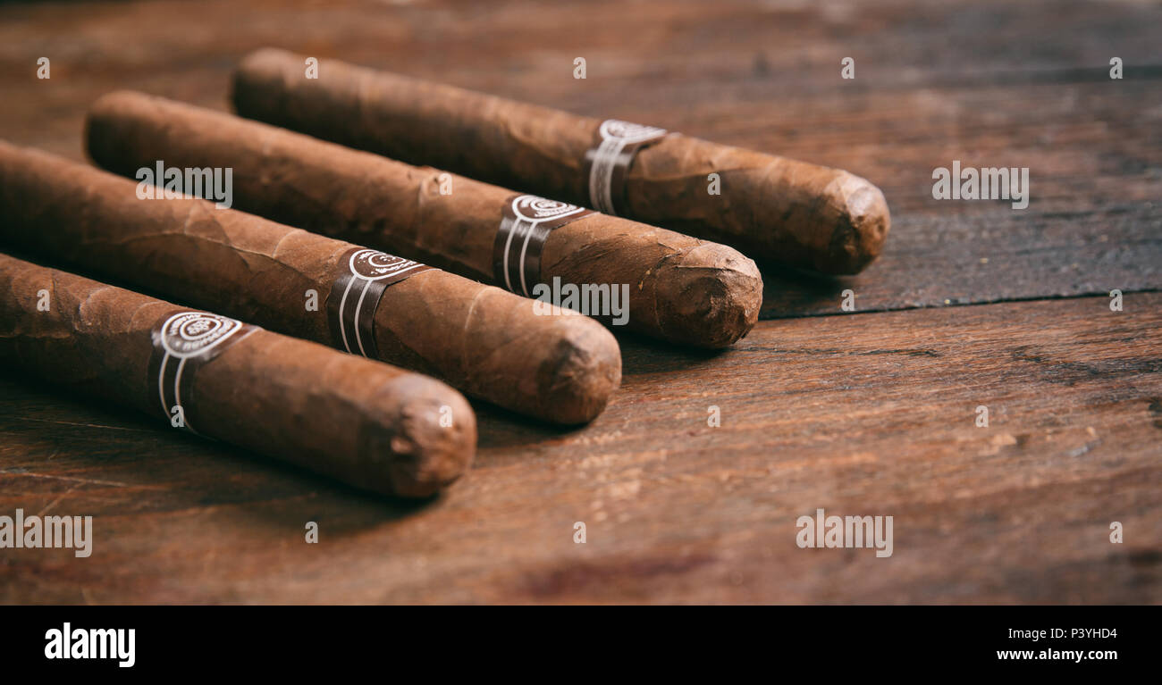 Cuban cigars on wooden background, copy space Stock Photo