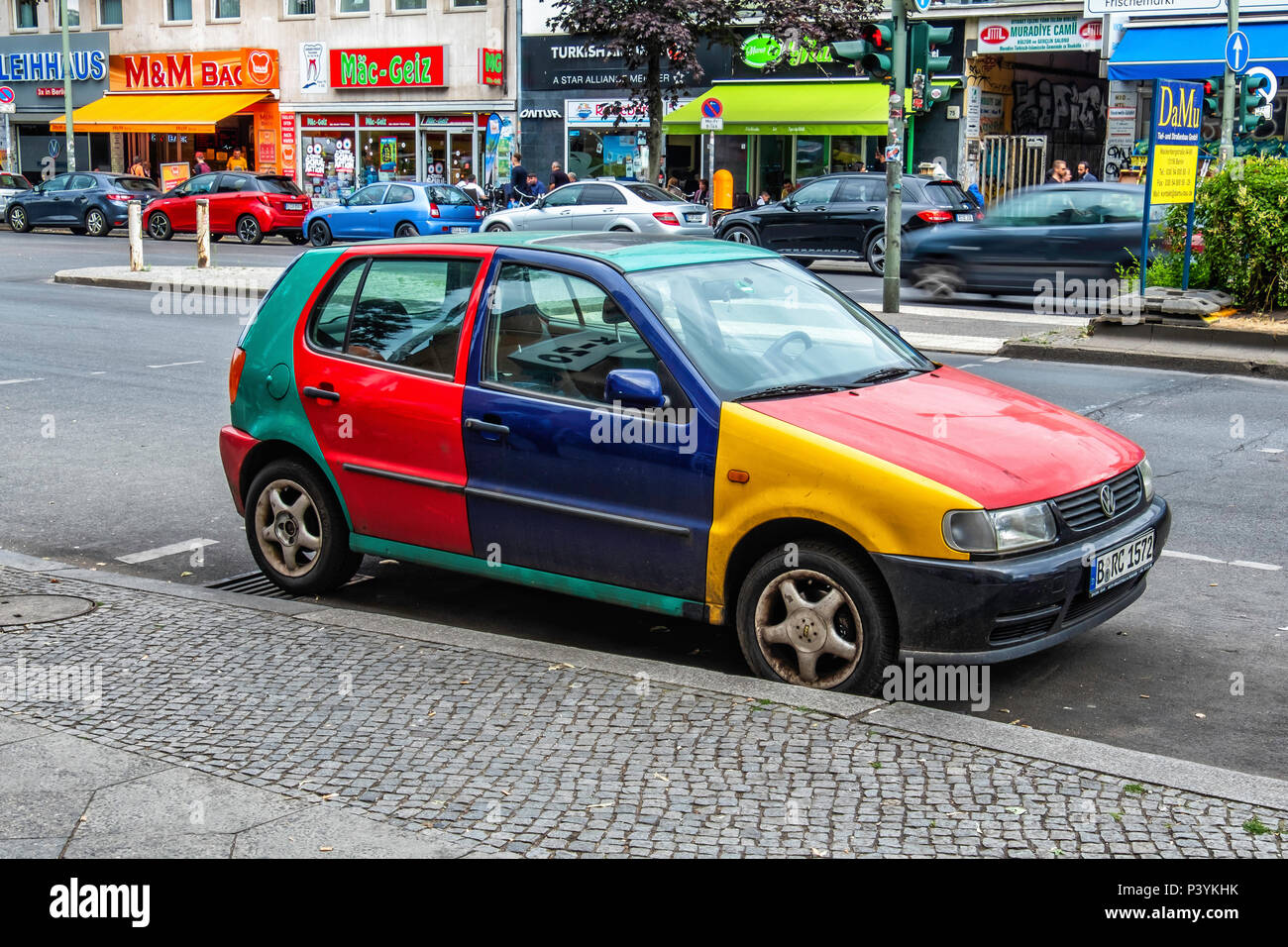 Rainbow coloured Volkswagen car parked In Kottbusser Damm, Kreuzberg,Berlin  Stock Photo - Alamy