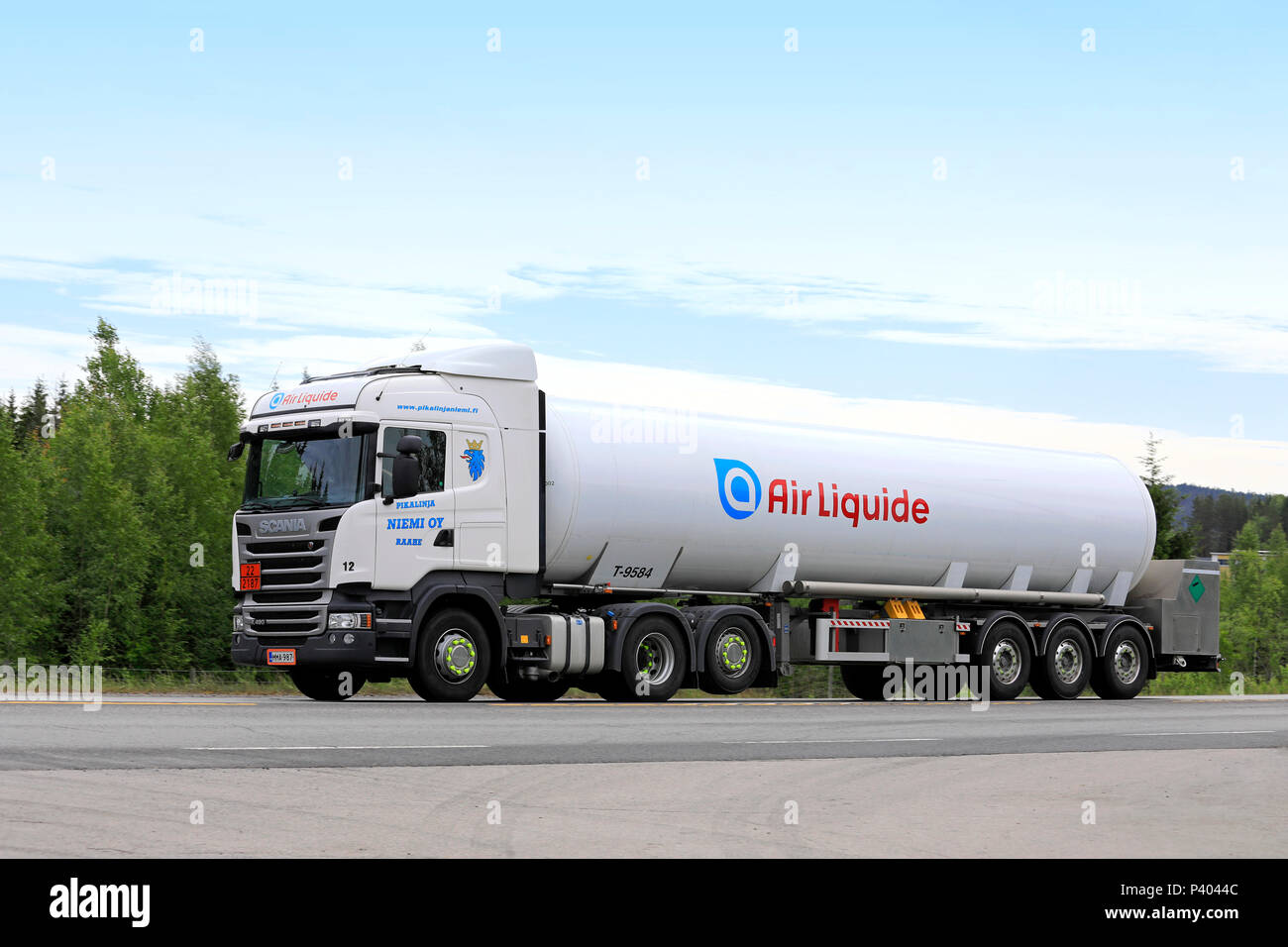 White Scania R490 semi tanker for Air Liquide ADR transport of Carbon dioxide refrigerated liquid on road. Hirvaskangas, Finland - June 15, 2018. Stock Photo