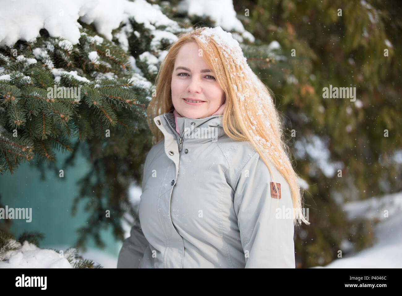 https://c8.alamy.com/comp/P4046C/belarus-the-city-of-gomel-on-march-2-2018-kindergarten-for-childrenbeautiful-woman-in-a-winter-day-with-long-hair-sprinkled-with-snow-P4046C.jpg