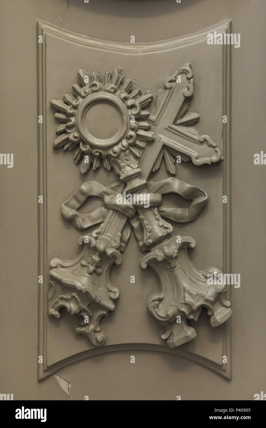 Reliquaries depicted in the wooden gate in the Clérigos Church (Igreja dos Clérigos) in Porto, Portugal. Stock Photo