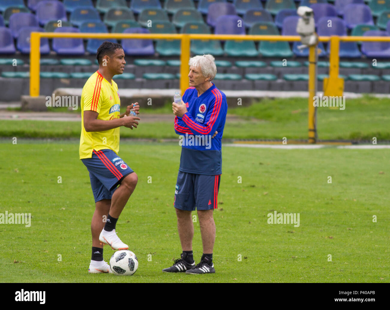 Luis Muriel(L) and Jose Pekerman (R) speaks in the training of the Colombia team at the Campin stadium Stock Photo