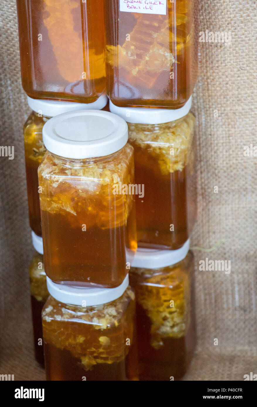 Glass jar of full of fresh honey with lid Stock Photo Alamy