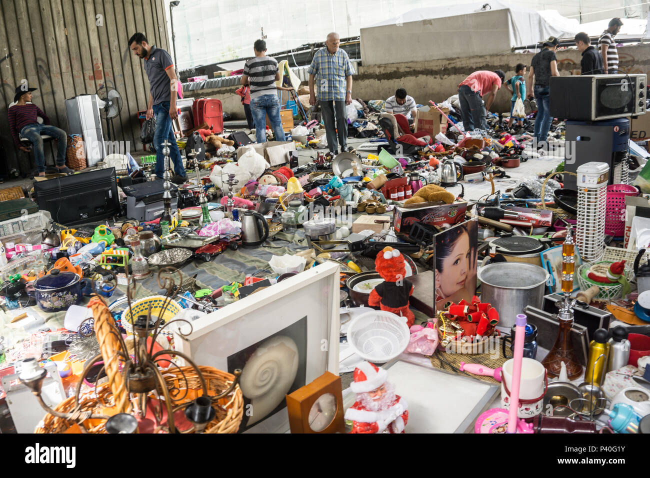 Used items stall in a flea market Stock Photo
