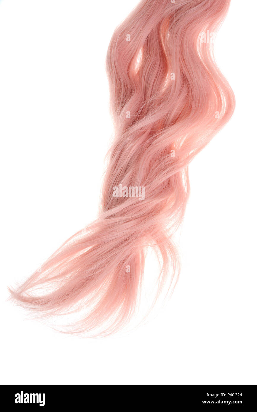 piece of curly pink hair isolated Stock Photo