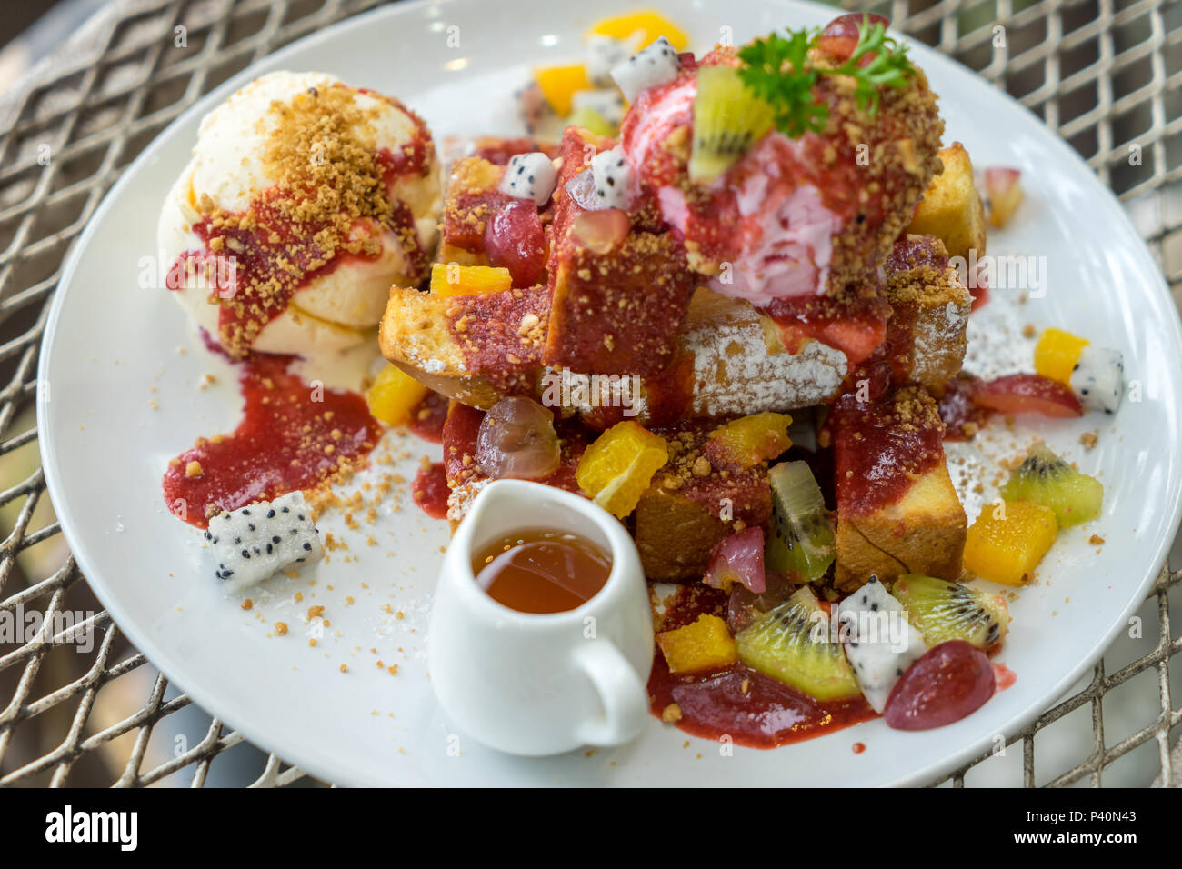 Dessert Plate Of Honey Toast With Ice Cream Vanilla Mixed Fresh Sliced Fruits Mango Slices Kiwi Dragon Fruit And Whipped Cream On Metal Table Stock Photo Alamy Dessert Plate Of Honey Toast With Ice Cream Vanilla Mixed Fresh Sliced Fruits Mango Slices Kiwi Dragon Fruit And Whipped Cream On Metal Table Stock Photo Alamy