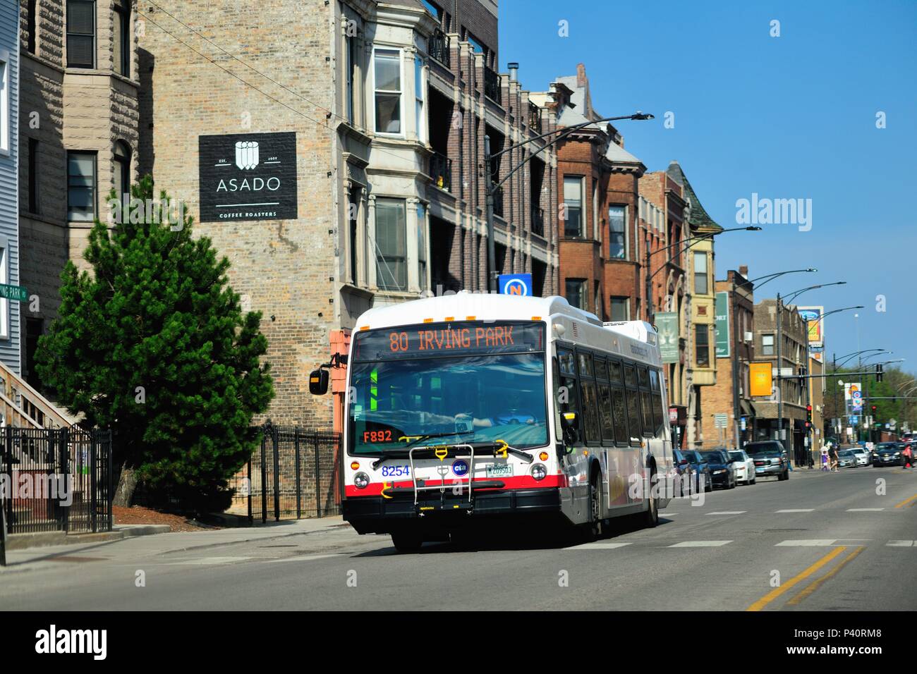 Chicago, Illinois, USA. A westbound Chicago Transit Authority (CTA) bus on Irving Park Road on the North Side of the city. Stock Photo
