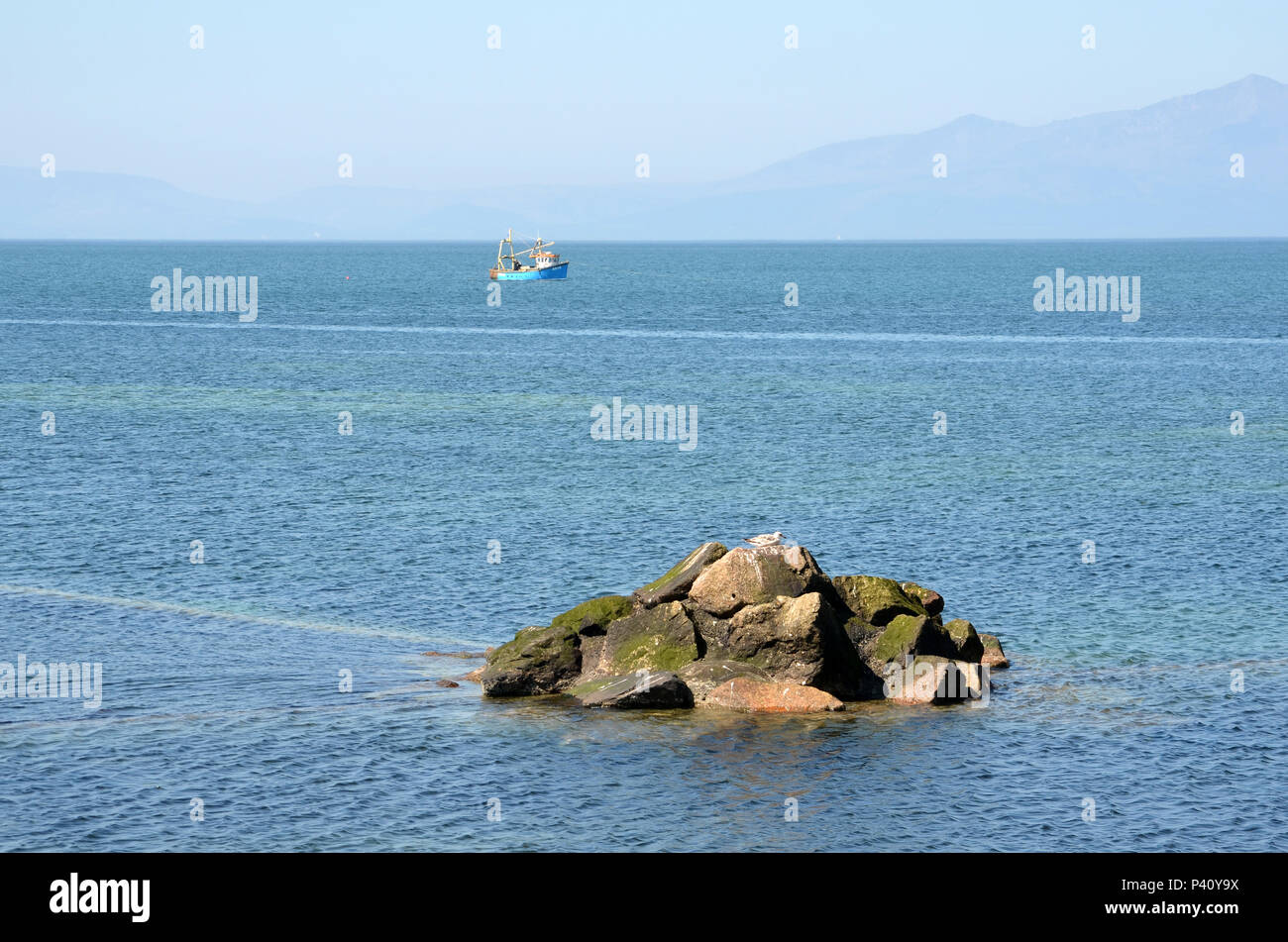 Fishing boat out at sea off the coast of Saltcoats Stock Photo