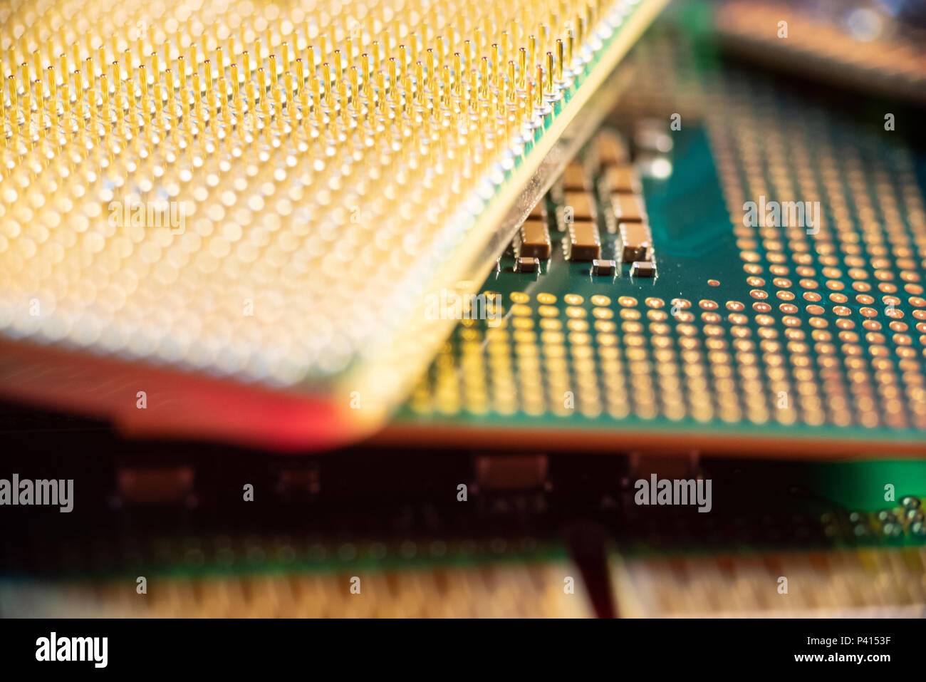 Two different CPUs showing different types of connections. Stock Photo