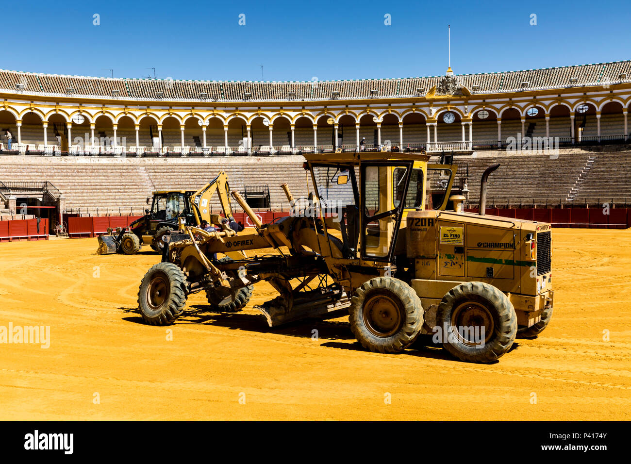 Maintenance machinery used to prepare Seville bullring for the next event day, Seville, Andalusia, Spain. Stock Photo