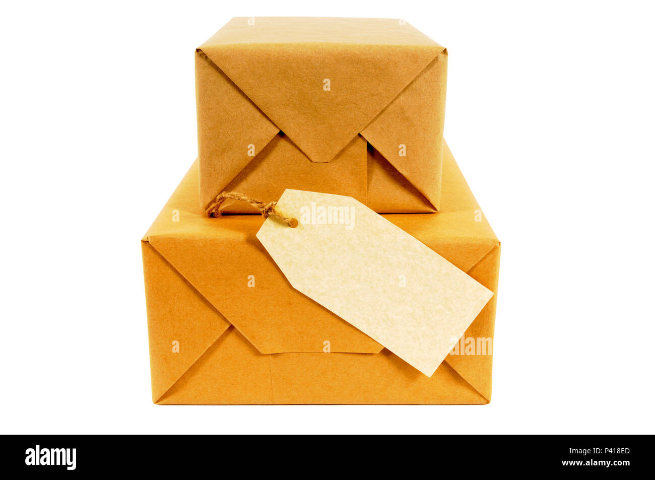 Brown paper wrapped packages with blank label Stock Photo Alamy