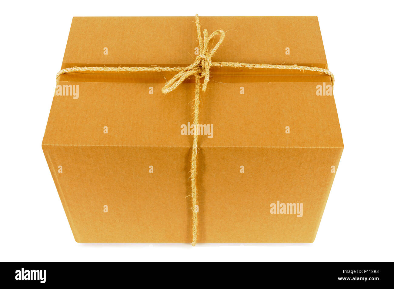 Cardboard box tied with rope Stock Photo - Alamy
