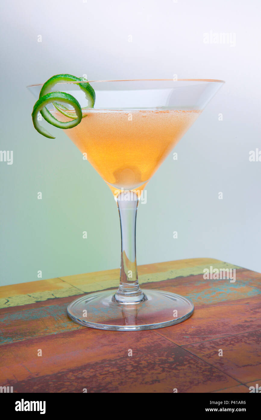 Golden Gimlet in martini glass Stock Photo Alamy