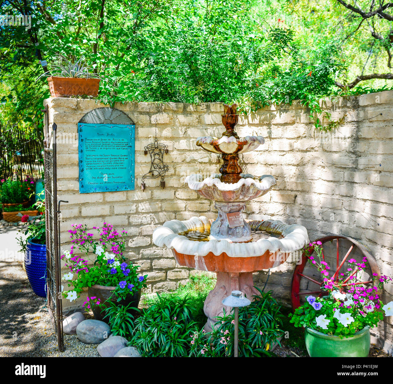 Lovely southwestern style garden with water fountain, dedicated to the neighborhood by the Tucson Botanical Gardens in Tucson, AZ Stock Photo