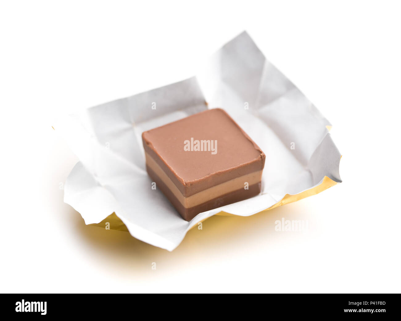 Wrapped nougat candy isolated on white background. Stock Photo