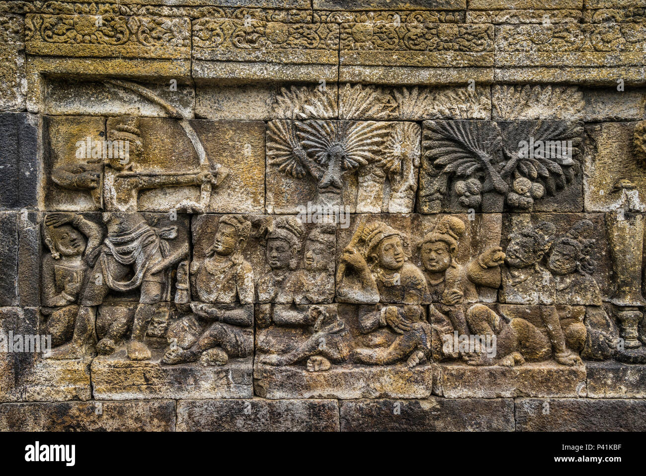 bas relief panel on a balustrade of 9th century Borobudur Buddhist temple, the approximately 2672 panels form one of the most comprehensive Buddhist n Stock Photo