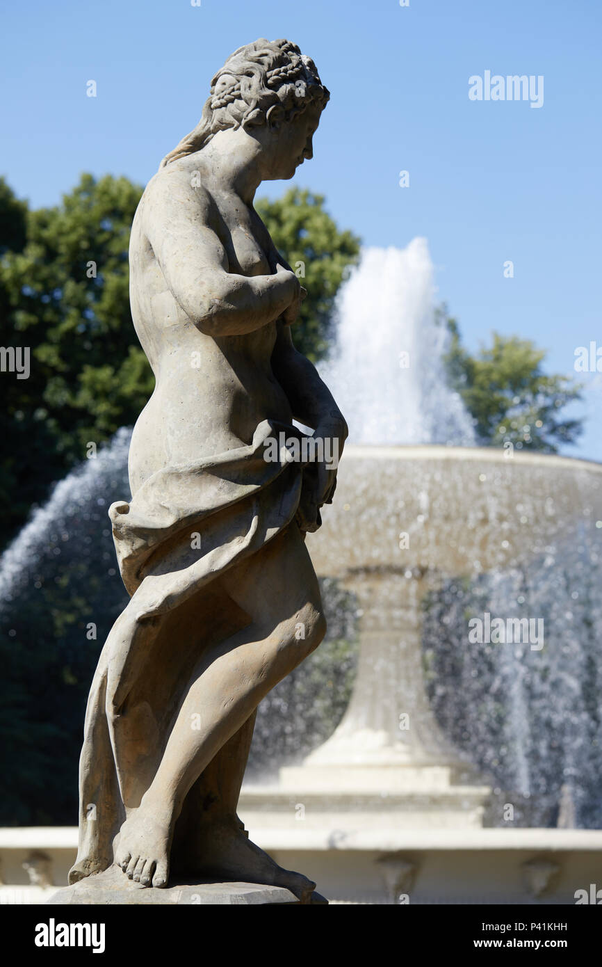 The statue of Venus in Saxon Park (Saski Park), Warsaw, Poland, set against the background of a fountain.. Stock Photo