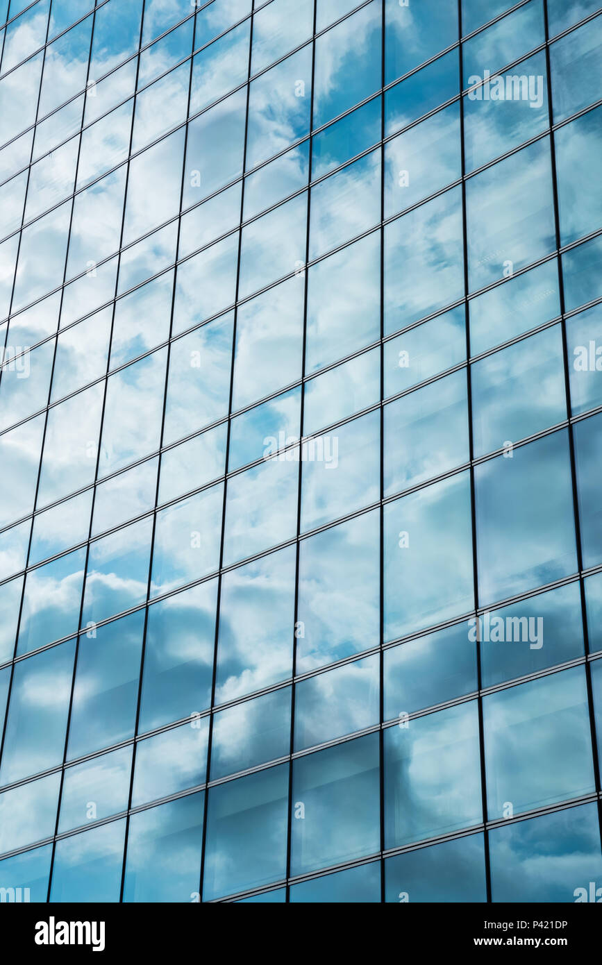 Glass facade of modern city high buildings, cloud reflection Stock ...