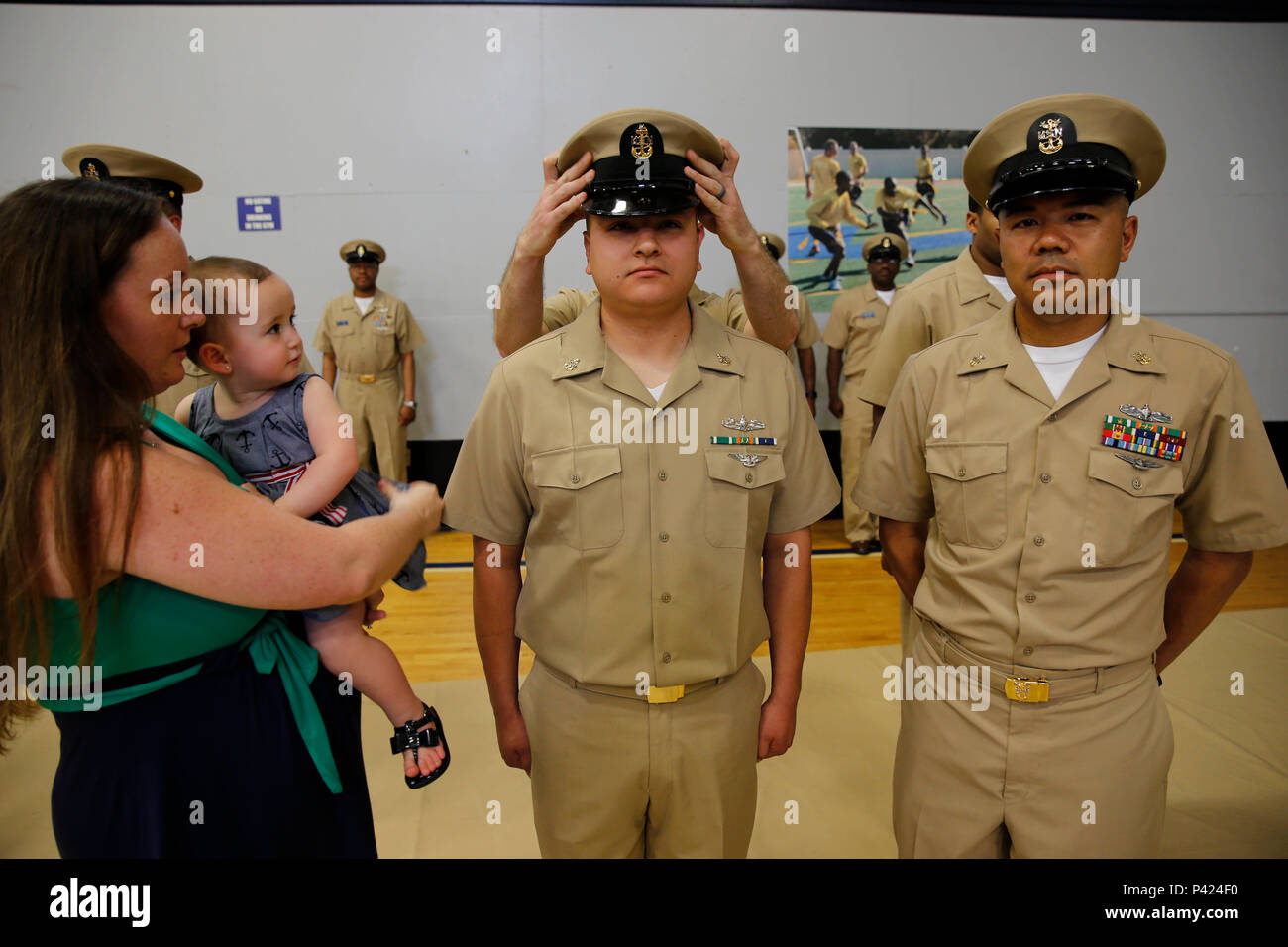 NEWPORT NEWS Va June 6 2016 Senior Chief Electronics Technician   Newport News Va June 6 2016 Senior Chief Electronics Technician Nuclear Justin Sequaptewa Assigned To Pre Commissioning Unit Gerald R Ford Cvn 78 Is Covered By Master Chief Machinists Mate Nuclear Douglas Troendle During Fords Senior Chief Petty Officer Pinning Ford Pinned 16 Senior Chief Petty Officers For The Fiscal Year 2016 Advancement Cycle Us Navy Photo By Mass Communication Specialist Seaman Apprentice Gitte Schirrmacherreleased P424F0 