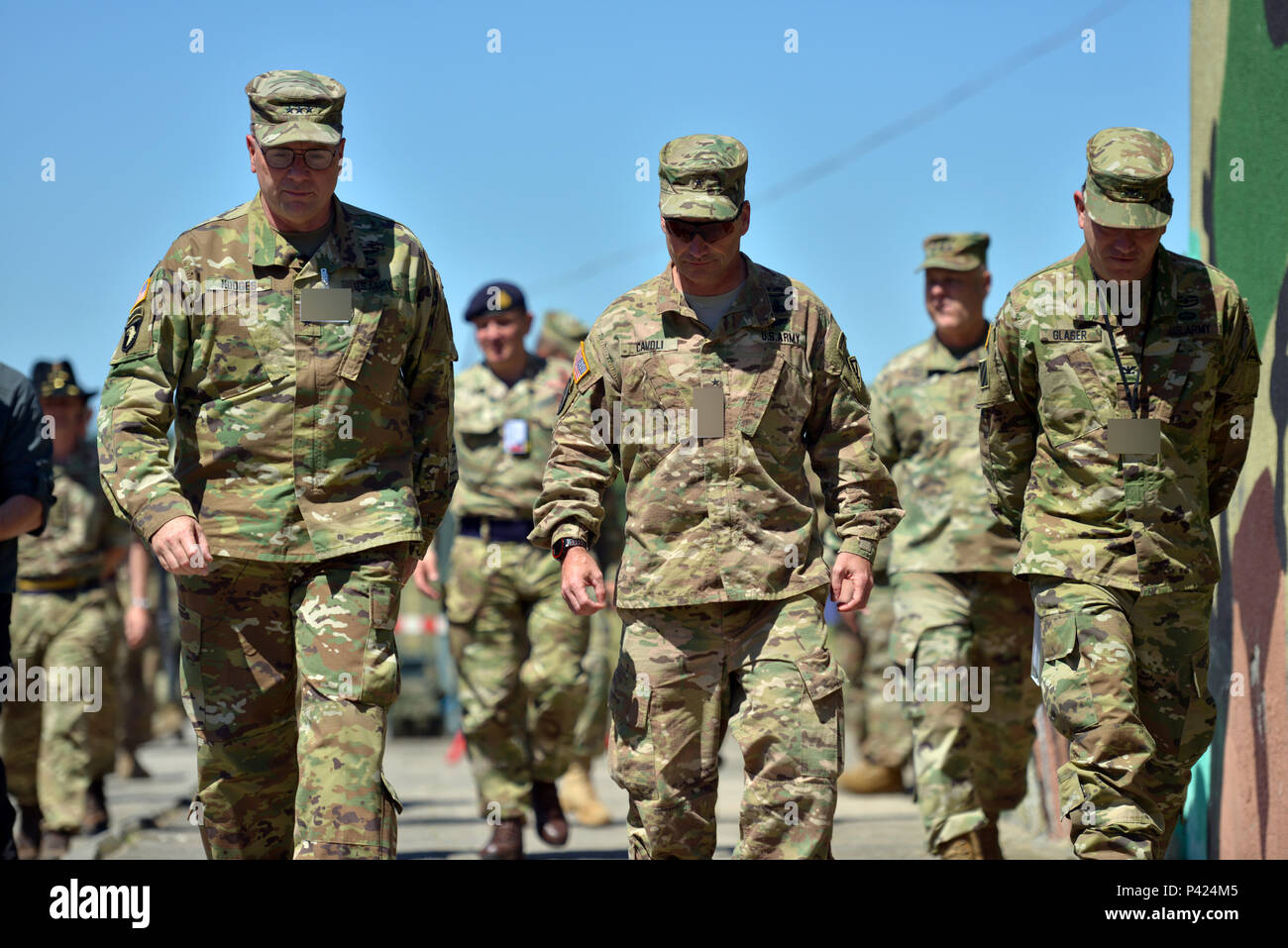 Lt. Gen. Ben Hodges, U.S. Army Europe Commander (left), Brig. Gen.  Christopher G. Cavoli, Commander of the 7th Army Joint Multinational  Training Command (middle) and Col. William Glaser (right) prepare for the