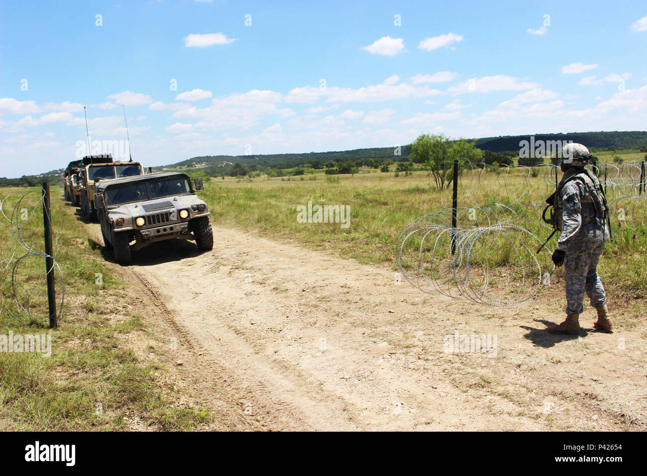Soldiers of the 287th Engineer Company, 890th Engineer Battalion, set up an Entry Control Point at the Command Post of the Special Troops Battalion, 155th Armored Brigade Combat Team on June 7, 2016, at Fort Hood, Texas. The 287th En. Co. is an enabler unit for the 155th Armored Brigade Combat Team’s Multi-integrated Echelon Brigade Training Exercise. (Mississippi National Guard photos by Sgt. Brittany Johnson 155th Armored Brigade Combat Team Public Affairs/Released) Stock Photo