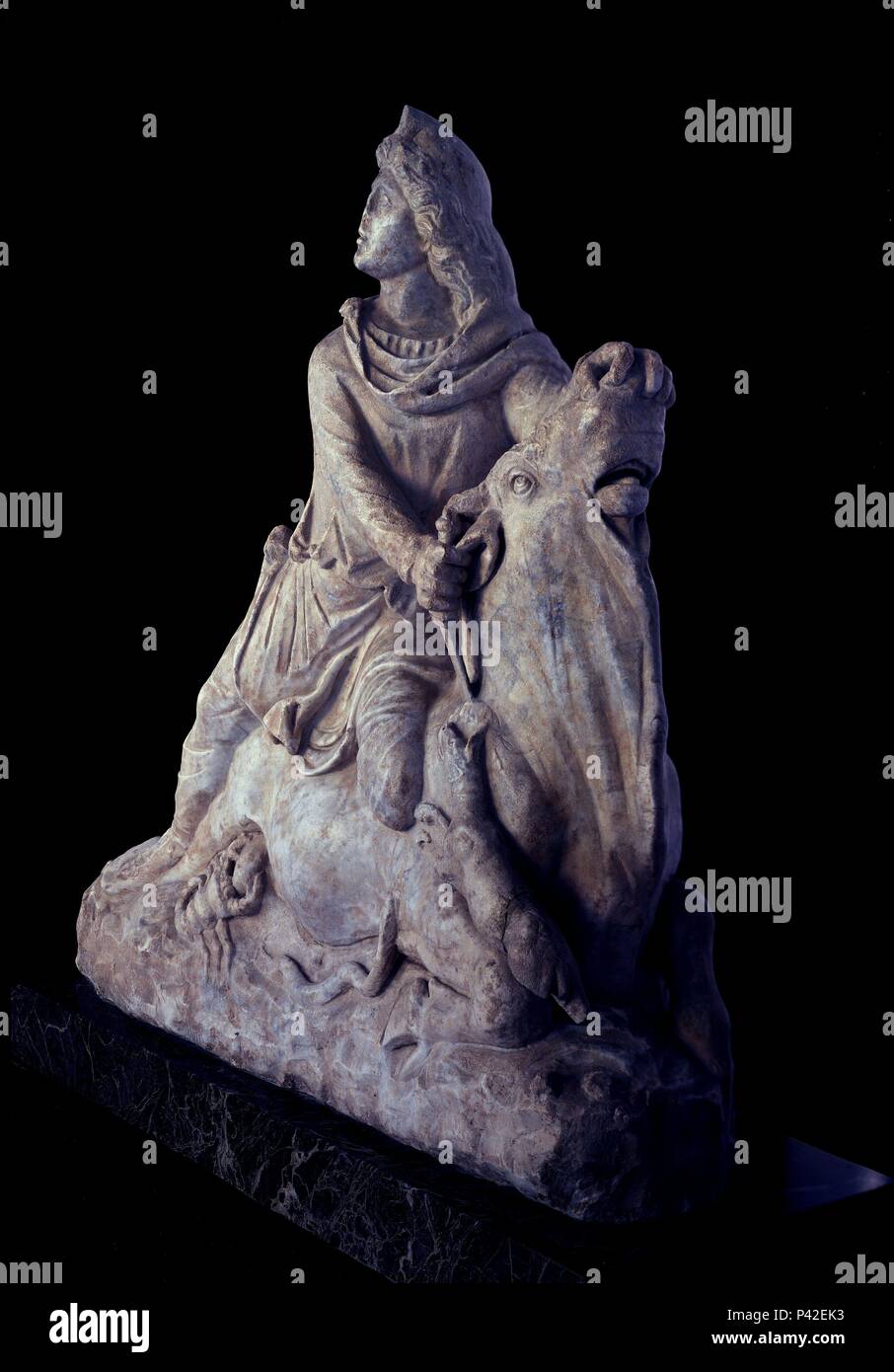 MITHRAS TAUROKTONOS - ESCULTURA ROMANA - MITOLOGIA ORIENTAL - RELIGION ROMANA - LUCHA ENTRE BIEN Y MAL - SIGLO II - 93x96x35 cm. Location: MUSEO ARQUEOLOGICO-COLECCION, CORDOBA. Stock Photo