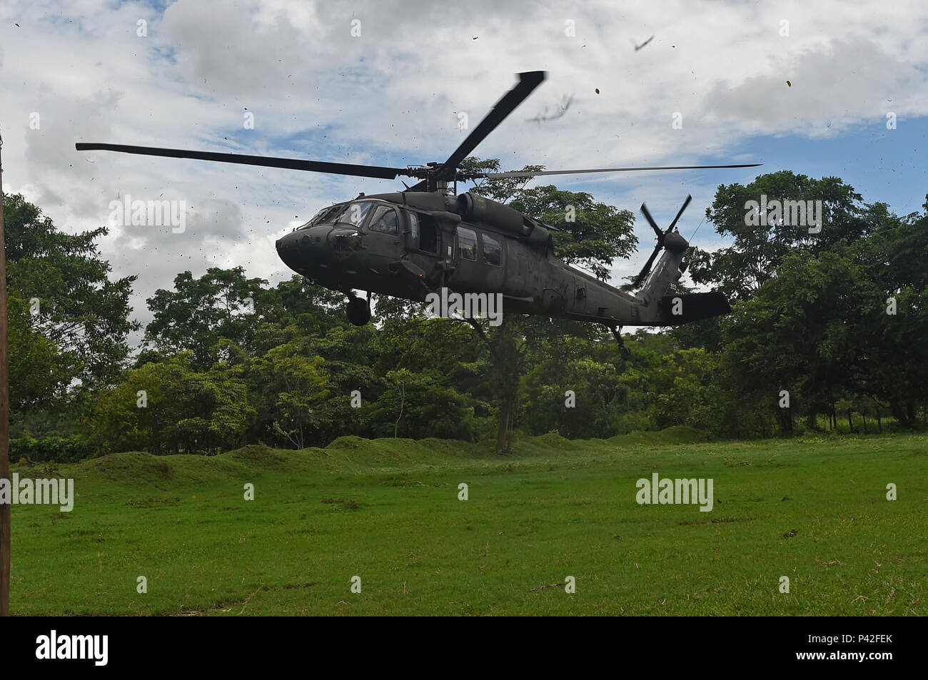 CATARINA, Guatemala – A New Hampshire National Guard UH-60 Black Hawk utility helicopter lands at the site of a new school building June 8, 2016, during Exercise BEYOND THE HORIZON 2016 GUATEMALA. The helicopter carried Arkansas National Guard Brig. Gen. Keith Klemmer, Assistant to The Adjutant General Support, to the site of the new school building to highlight the amount of progress made and show the working conditions for the Soldiers involved. (U.S. Air Force photo by Senior Airman Dillon Davis/Released) Stock Photo