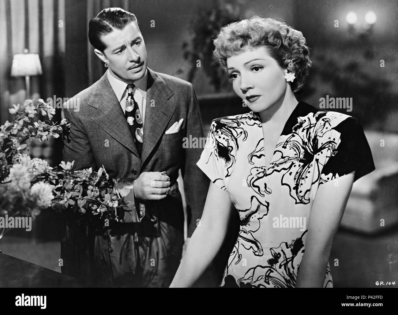 Original Film Title: GUEST WIFE.  English Title: GUEST WIFE.  Film Director: SAM WOOD.  Year: 1945.  Stars: CLAUDETTE COLBERT; DON AMECHE. Credit: UNITED ARTISTS / Album Stock Photo