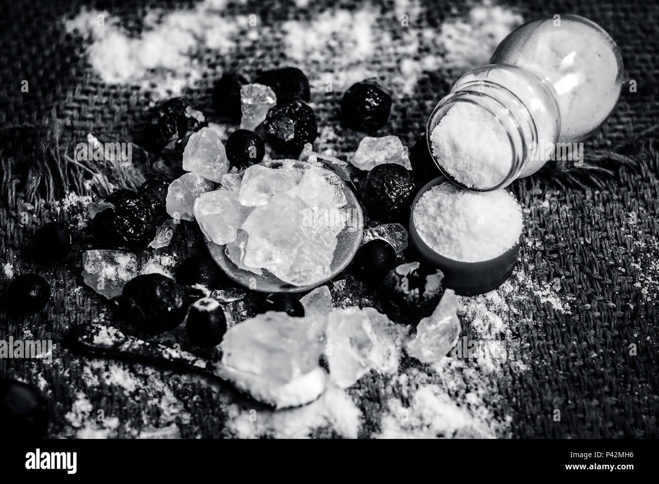 Close up of crystallized alum,Potassium alum and its powder with soap nut,Sapindus and salt