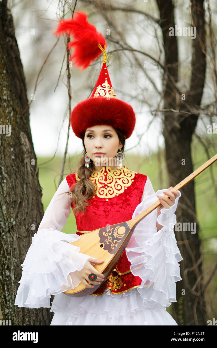 beautiful kazakh woman in national dress Stock Photo - Alamy