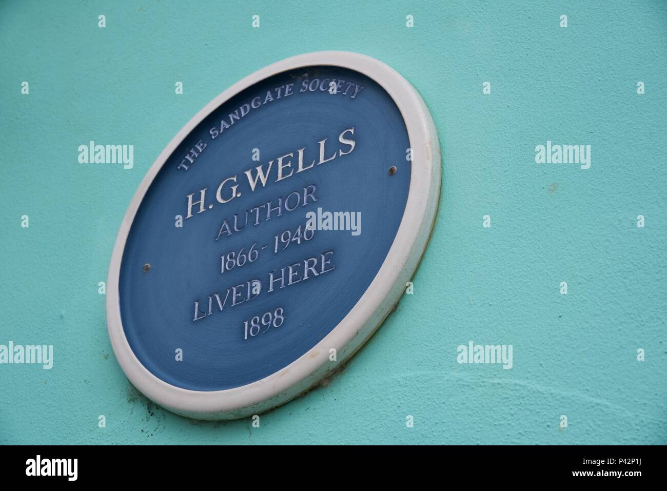 H.G.Wells: a commemorative wall plaque announces that H.G.Wells, the father of science fiction, once lived in this house in Sandgate, Kent Stock Photo