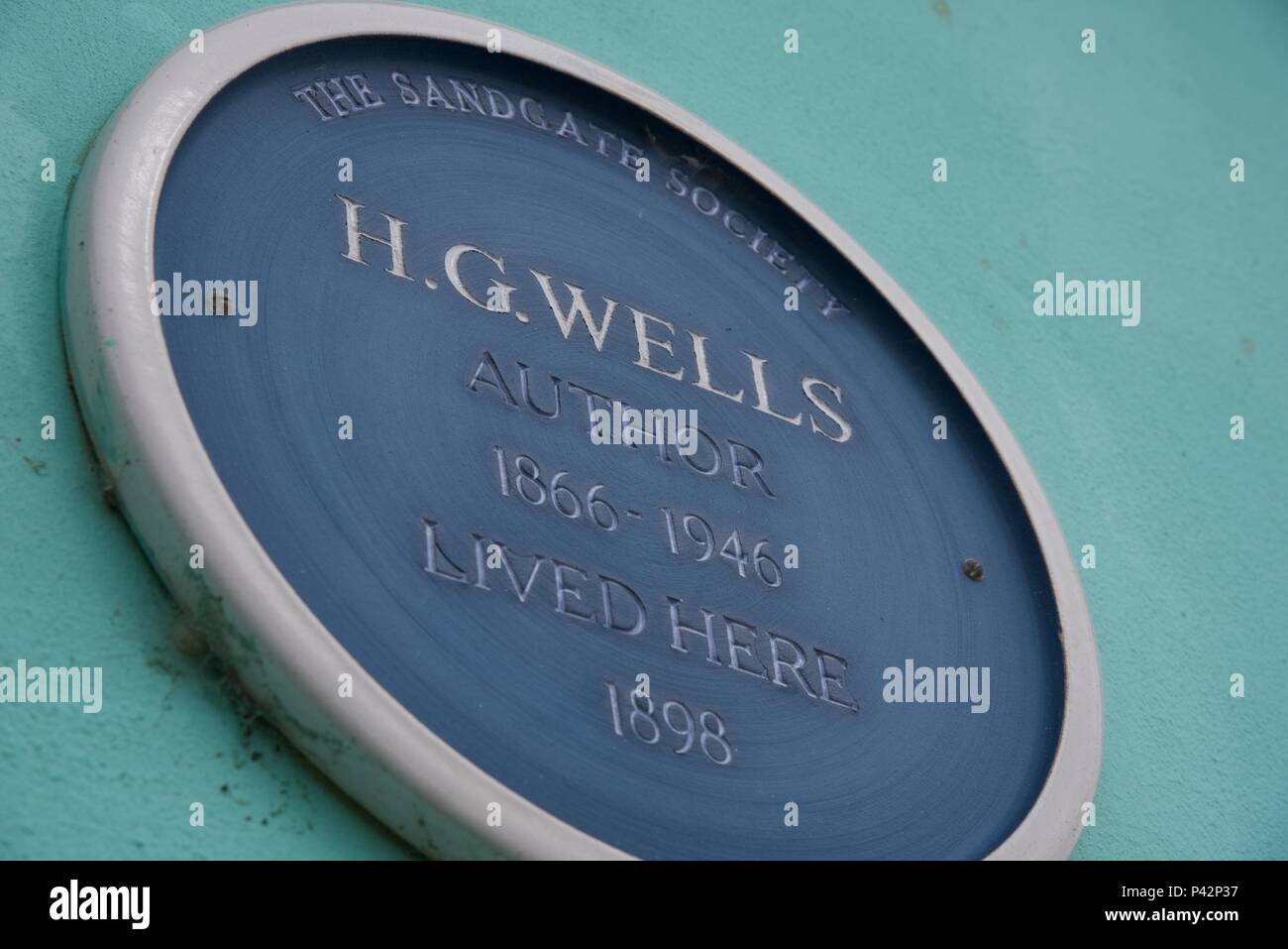H.G.Wells: a commemorative wall plaque announces that H.G.Wells, the father of science fiction, once lived in this house in Sandgate, Kent Stock Photo