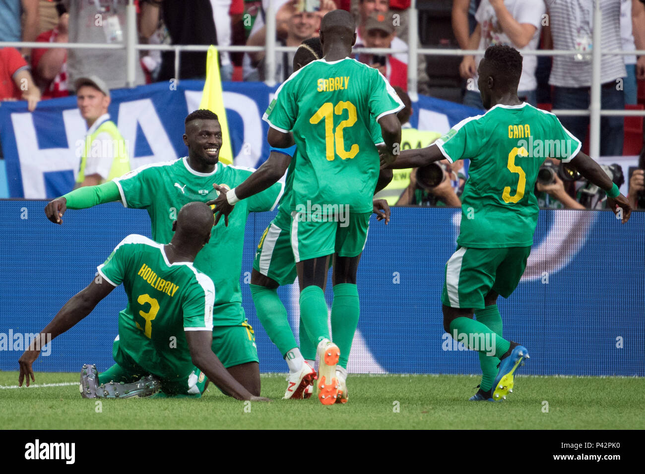 Moscow, Russia. 19th June, 2018. Soccer: World Cup 2018, group stages, group H: Poland vs Senegal at Spartak Stadium. Senegal's Kalidou Koulibaly (L-R), M'Baye Niang, Youssouf Sabaly and Idrissa Gueye celebrate the 2-0 goal. Credit: Federico Gambarini/dpa/Alamy Live News Stock Photo