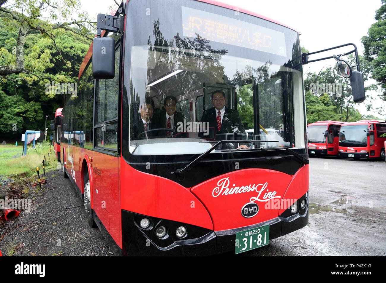 Kyoto, Japan. 20th June, 2018. A BYD electric bus is about to set out in Kyoto, Japan, June 20, 2018. Japanese company Princess Line bought five electric buses from Chinese automaker BYD in 2015 and two more in 2017. The seven buses have now travelled some 370 thousand kilometers, cutting costs for their owner and reducing emissions for the city. Credit: Ma Ping/Xinhua/Alamy Live News Stock Photo