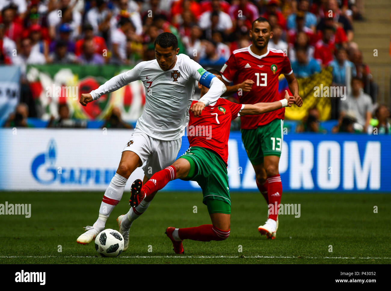 Luzhniki Stadium, Moscow, Russia. 20th June, 2018. FIFA World Cup Football, Group B, Portugal versus Morocco; Cristiano Ronaldo of Portugal skips the tackle from Hakim Ziyach of Morocco Credit: Action Plus Sports/Alamy Live News Stock Photo