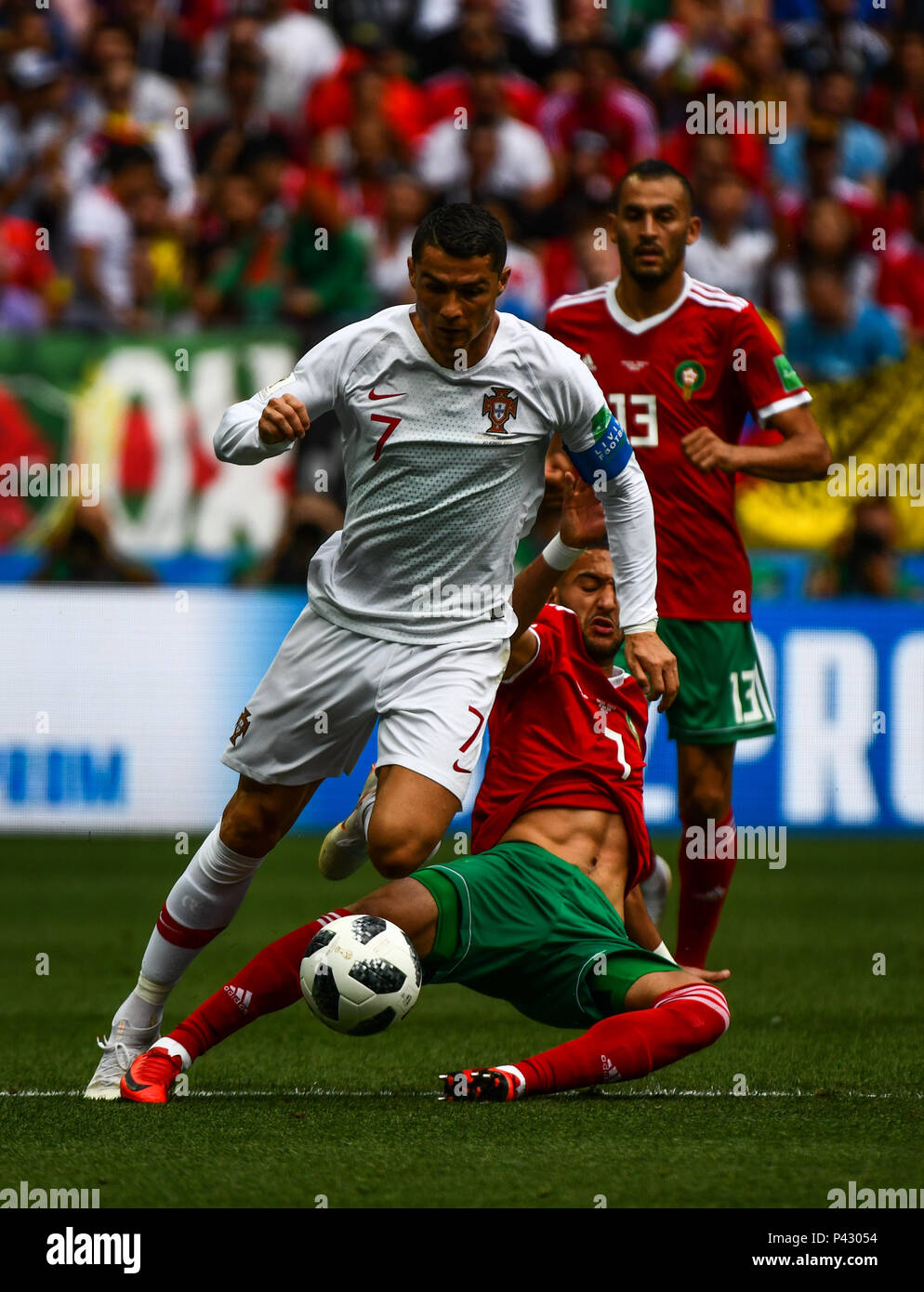 Luzhniki Stadium, Moscow, Russia. 20th June, 2018. FIFA World Cup Football, Group B, Portugal versus Morocco; Cristiano Ronaldo of Portugal skips the tackle from Hakim Ziyach of Morocco Credit: Action Plus Sports/Alamy Live News Stock Photo