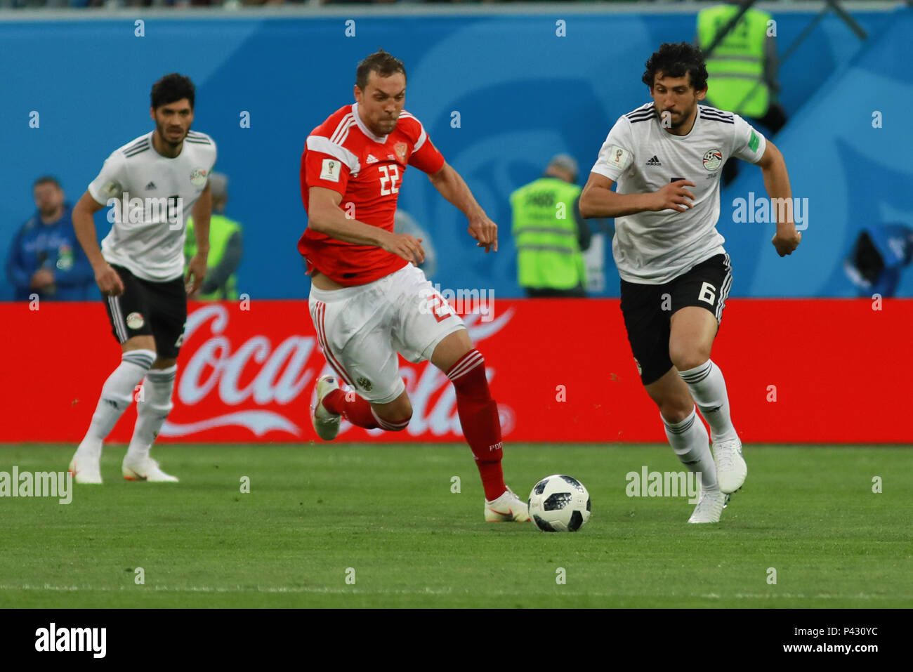 St Petersburg, Russia. 19 June 2018. Dzyuba and Ahmed Hegazy during the match between Russia and Egypt valid for the 2018 World Cup held at the Zenit Arena in St. Petersburg, Russia. (Photo: Ricardo Moreira/Fotoarena) Credit: Foto Arena LTDA/Alamy Live News Stock Photo