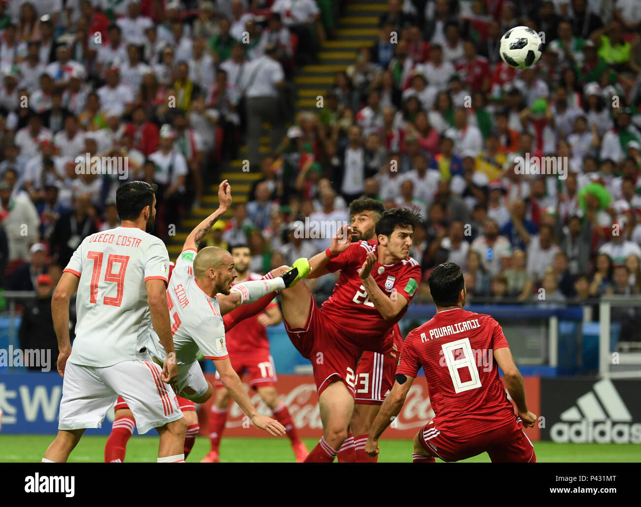 Kazan, Russia. 20th June, 2018. David Silva (2nd L) of Spain shoots during a Group B match between Spain and Iran at the 2018 FIFA World Cup in Kazan, Russia, June 20, 2018. Credit: Chen Cheng/Xinhua/Alamy Live News Stock Photo