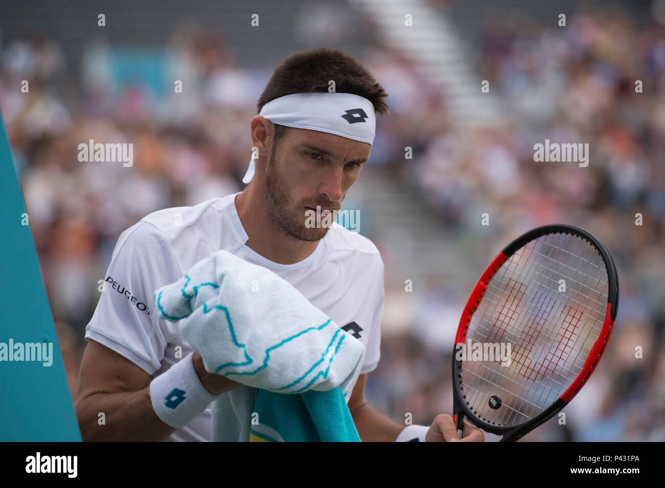 The Queen’s Club, London, UK. 20 June, 2018. Day 3 of the Fever Tree Championships on centre court with Leonardo Mayer (ARG) in action against Frances Tiafoe (USA). Credit: Malcolm Park/Alamy Live News. Stock Photo