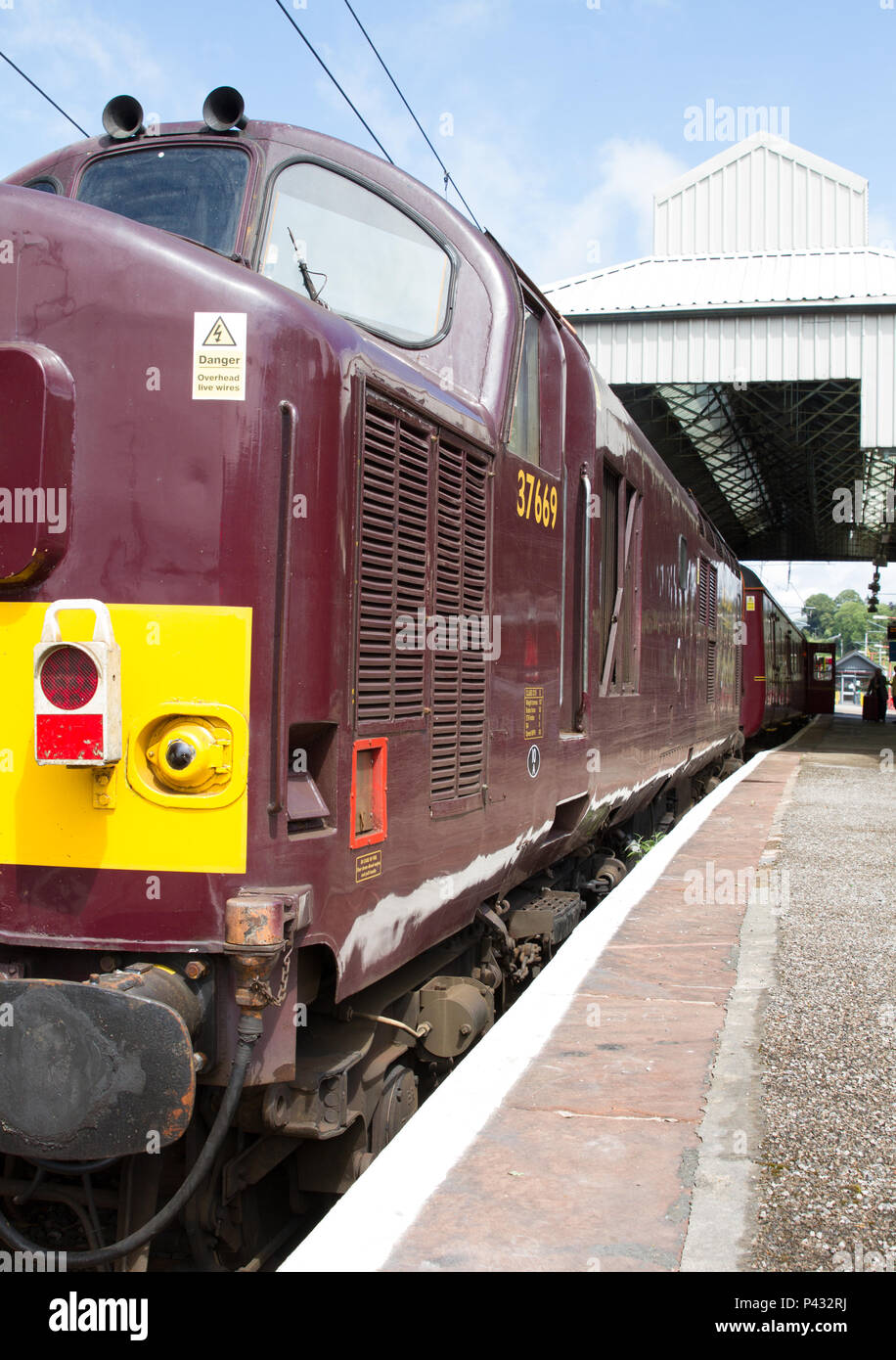 Oxenholme, Lake District, UK. 20th June, 2018. West Coast Railways heritage class 37 in use on the Windermere Branch. Charles Allen/Alamy Live News Stock Photo
