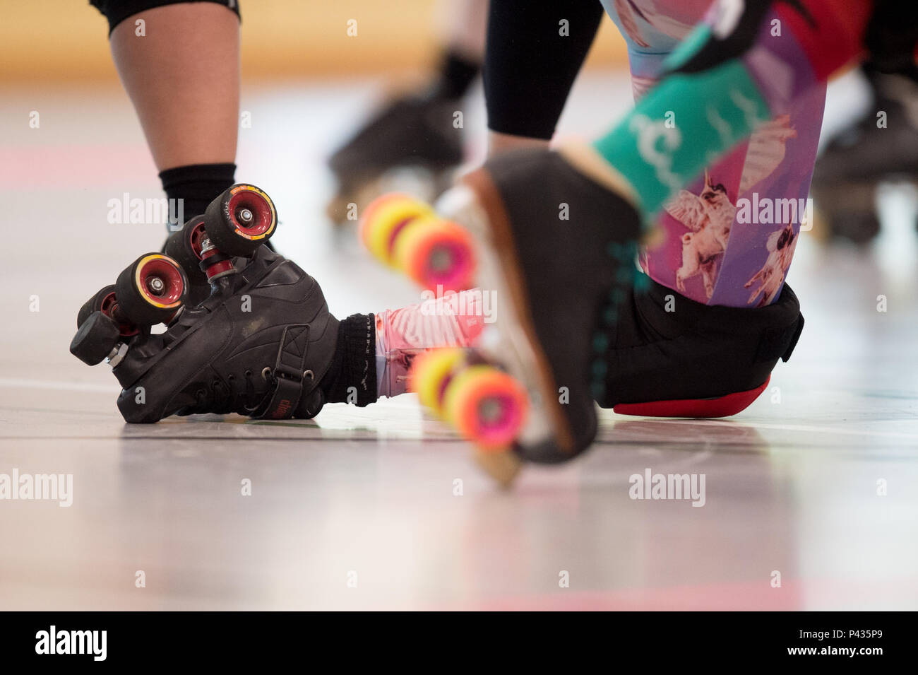 Germany, Potsdam. 14th Apr, 2018. A roller skater falls on the ground  during a game. Roller derby means full contact on roller skates. Women are  the stars of this sport, they want