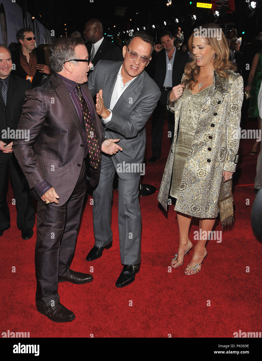 Robin Williams, with John Travolta and Kelly Preston ( checking the belly ! )   - Old Dogs Premiere at the El Capitan Theatre In Los Angeles.          -            07 WilliamsR HanksT WilsonRita 07.jpg07 WilliamsR HanksT WilsonRita 07  Event in Hollywood Life - California, Red Carpet Event, USA, Film Industry, Celebrities, Photography, Bestof, Arts Culture and Entertainment, Topix Celebrities fashion, Best of, Hollywood Life, Event in Hollywood Life - California, Red Carpet and backstage, movie celebrities, TV celebrities, Music celebrities, Topix, actors from the same movie, cast and co star  Stock Photo
